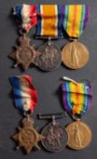 A WWI 2nd Battalion Royal Berkshire Regiment family group, comprising two trios of 1914 Star,