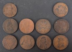 Ten copper 18th Century trade tokens.
