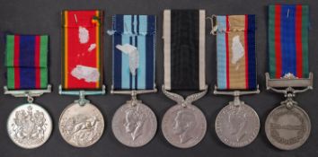 A group of five WWII medals, comprising Africa Service Medal, Australia Service Medal,
