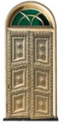 An Indian carved gold painted wood door casement with two doors,