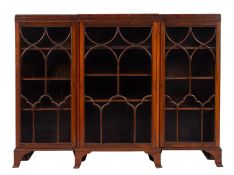 An Edwardian mahogany breakfront display cabinet or bookcase,