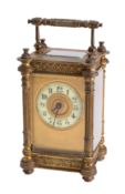 A decorative French Victorian carriage clock the eight-day duration timepiece movement having a