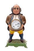 Bramley & Hubbard an American painted cast iron mantel clock modelled as a Georgian gentleman with