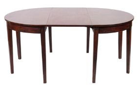 A George III mahogany extending dining table,