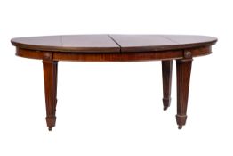 A mahogany extending dining table, in Regency style,
