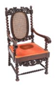 A Charles II walnut and canework elbow chair,