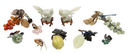 A collection of 'The Famous Peking Fruits' in jade and hardstones together with a pair of similar