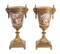 A pair of late 19th century gilt-metal and 'Sevres' porcelain mounted cassollette bases with