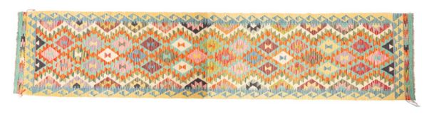 An Anatolian Turksih Kelim, the serrated lozenge all over field in multiple bright colours,