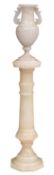 An Italian sculpted alabaster lamp, and associated alabaster pedestal,