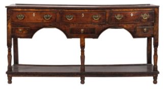 A late 18th-century oak and fruitwood rectangular dresser base;