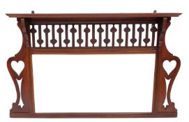 An Edwardian mahogany overmantel mirrror; of Arts and Crafts design,