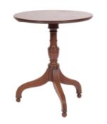 A mahogany circular occasional table, in Gillow's manner,