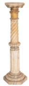 A Victorian carved alabaster jardiniere stand;