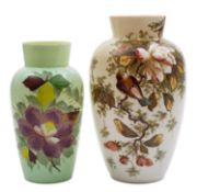 Two Continental opaque glass vases of pale green hue one enamelled with a songbird amongst blooms