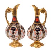 A pair of Royal Crown Derby porcelain ewers in the 'Old Imari' pattern [1128],
