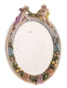 A Continental porcelain easel mirror in the Meissen manner,