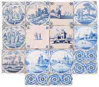 A group of eleven mixed delft tiles, painted in blue with a variety of Biblical,
