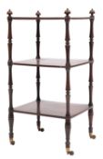 An early 19th-century rosewood three-tier rectangular whatnot; with turned finials, turned uprights,