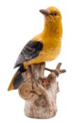 A Continental porcelain model of a Golden Oriole after the Meissen original,