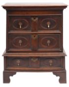 An oak chest in the Jacobean style, in two sections,