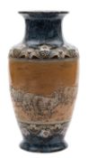 A Doulton Lambeth stoneware vase by Hannah Barlow sgraffito decorated with a flock of sheep in a