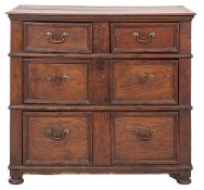 A Jacobean oak rectangular chest, containing two short and two long moulded panel drawers,