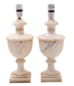 A pair of Continental alabaster urns fitted as table lamps,