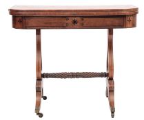 A Regency mahogany and inlaid card table; bordered with ebony lines,