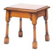 An oak joint stool in the 18th-century taste; with a rectangular moulded top,