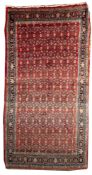 A Bidjar Kelleh, the brick red field with an all over geometric stellar design,