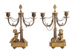 A pair of French gilt bronze twin light candelabra,