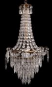 A gilt metal and cut glass hung electrolier in Regency taste,
