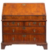 A George I walnut bureau,