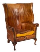 A beech wing frame club armchair,