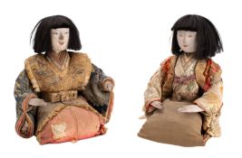 Two Japanese kabuki theatre dolls, Meiji period each with clay head and hands,