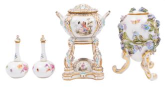 A pair of Meissen miniature bottle vases and covers; a Meissen tripod vase and cover;