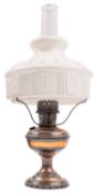 A copper and glass table oil lamp, 20th century, by the Aladdin Mantle Lamp Co.