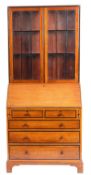 A mahogany and ebony banded bureau bookcase,