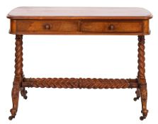 A Victorian walnut writing table, the rectangular top with a moulded edge and rounded ends,