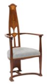 An Arts and Crafts mahogany and inlaid occasional open armchair;