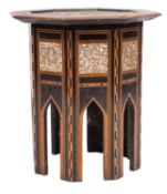 A pair of Near Eastern inlaid octagonal occasional tables;