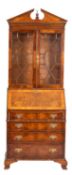 A walnut bureau bookcase in the George III style, 20th Century,