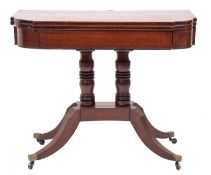 A Regency mahogany and ebony inlaid card table; of breakfront outline,