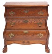 A Dutch oak three-drawer commode in 18th-century style, late 20th century; of small proportions,