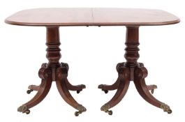 A Regency mahogany D-end twin pillar dining table;