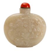 A Chinese jade snuff bottle and stopper and an enamel snuff bottle and stopper the first carved