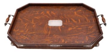 An oak and silver plated metal mounted tray,