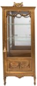A late 19th-century Continental giltwood vitrine;