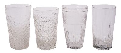 A mixed group of drinking glasses, comprising an ale mug engraved with hops and barley,